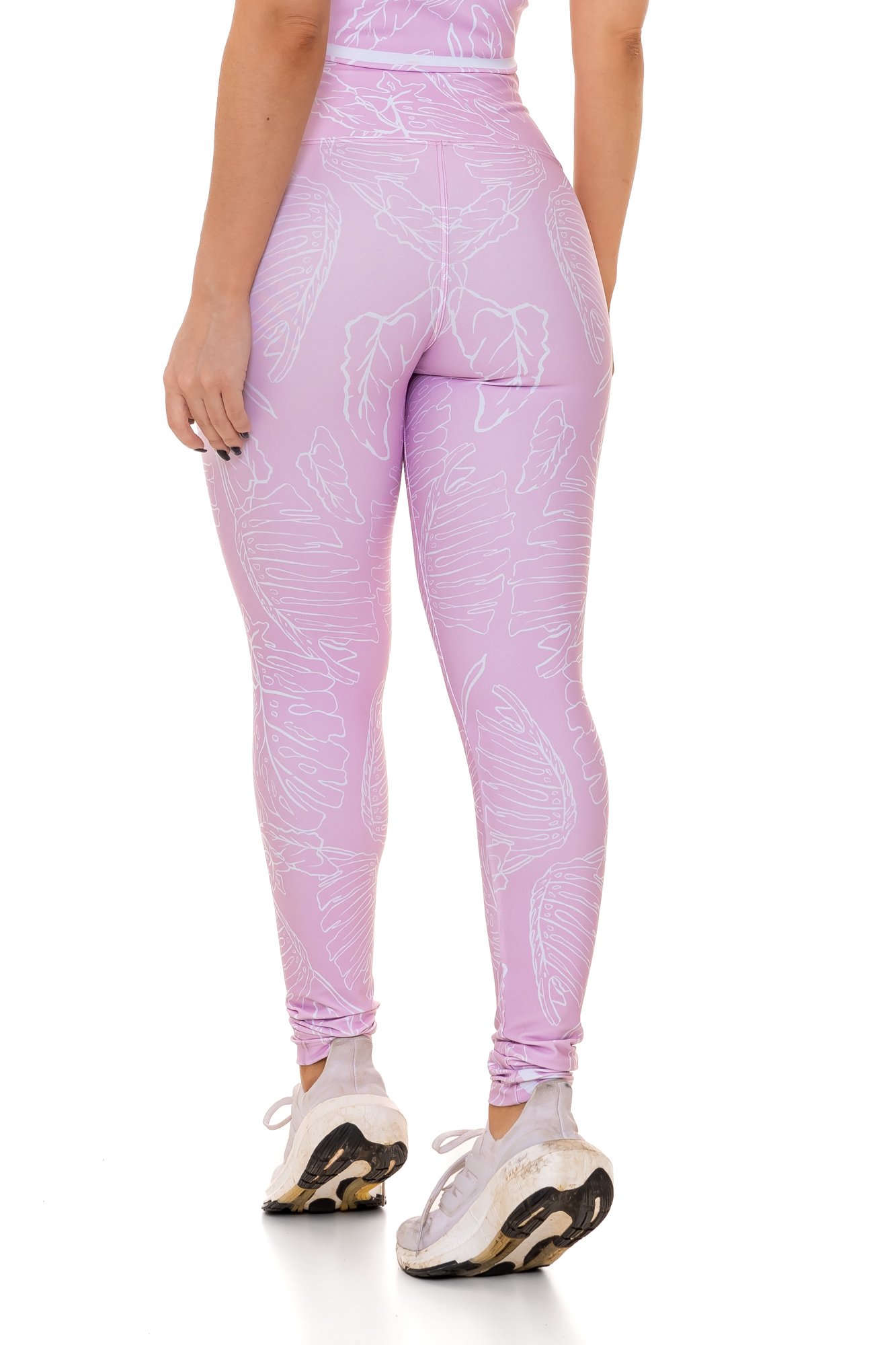Legging fitness rosa claro com estampa digital visto de costas, com modelagem anatômica, perfeito para treinos com estilo e conforto.
