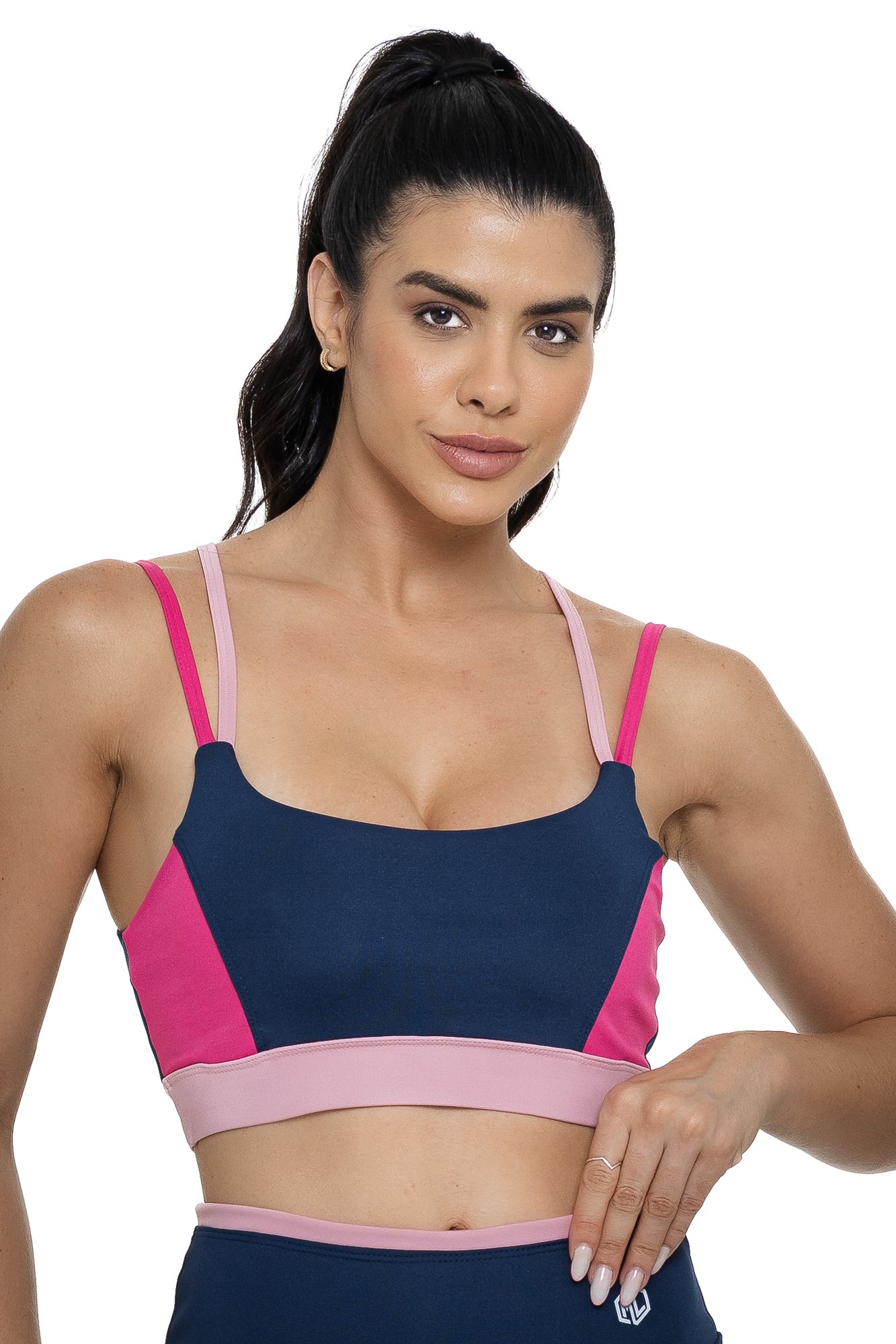 Top fitness com alça dupla azul marinho e rosa com recortes visto de frente, ideal para treinos com estilo e praticidade.