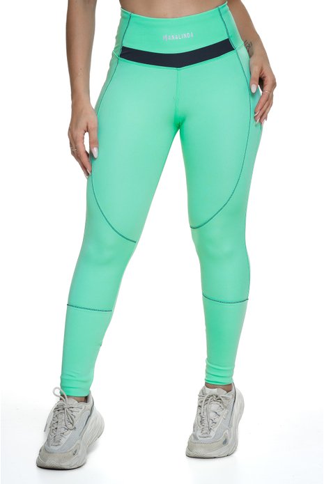 Legging feminina verde água e grafite com recortes visto de frente, projetado para conforto e mobilidade, ideal para treinos com estilo e praticidade.