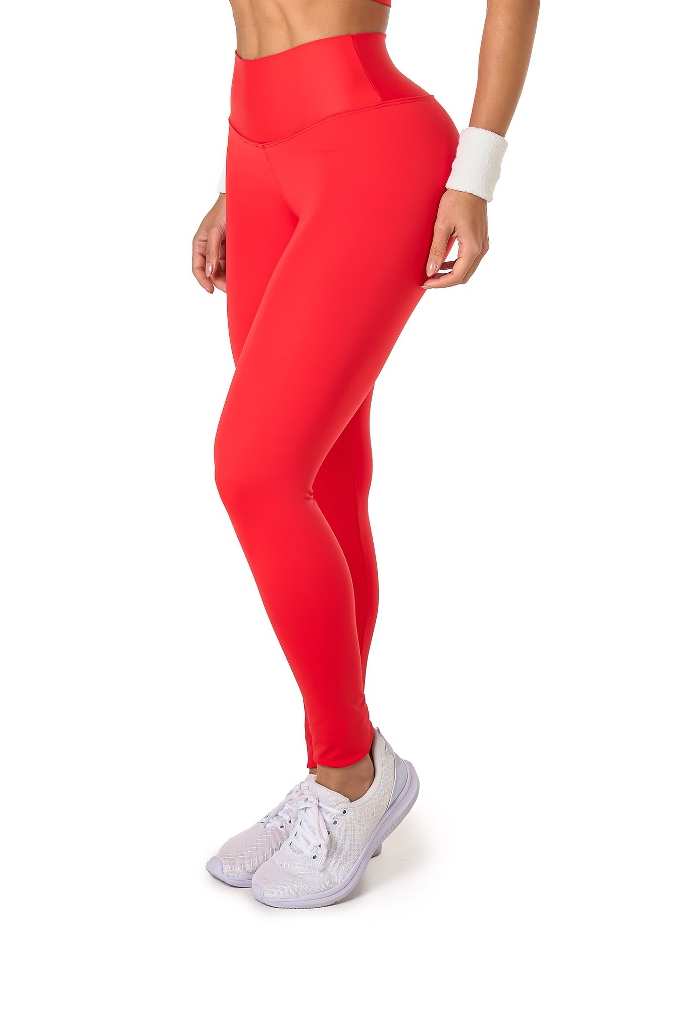 Legging básica vermelha em poliamida, projetado para conforto e mobilidade, ideal para treinos com estilo e praticidade.
