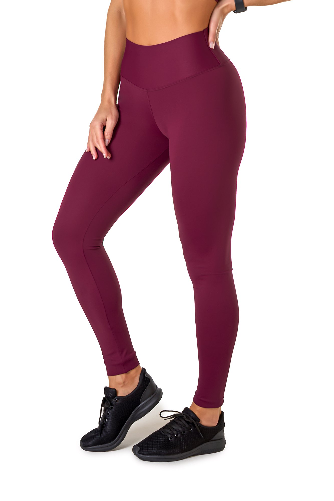 Legging básica roxa em poliamida, projetado para conforto e mobilidade, ideal para treinos com estilo e praticidade.