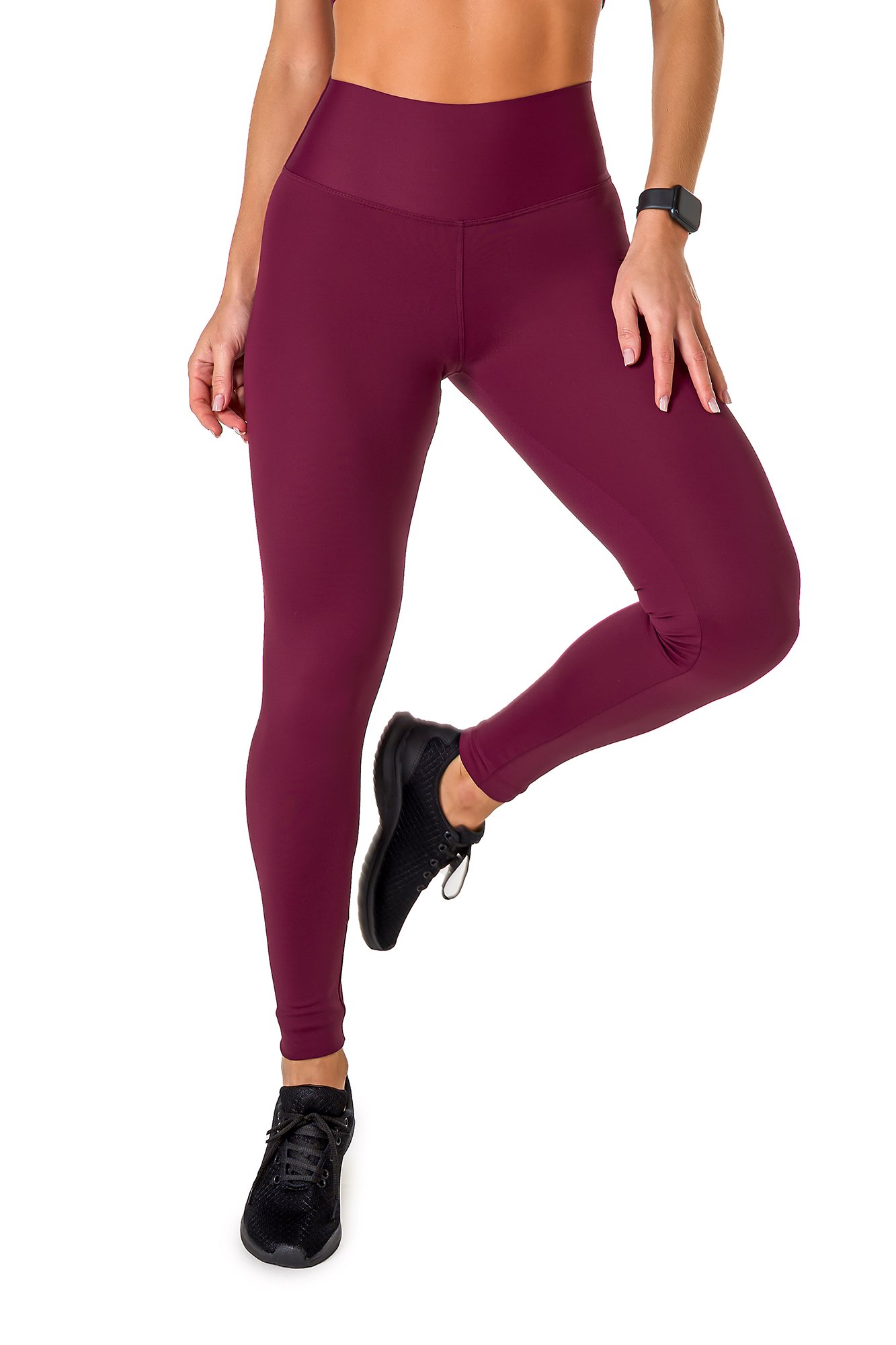 Legging básica roxa em poliamida, projetado para conforto e mobilidade, ideal para treinos com estilo e praticidade.