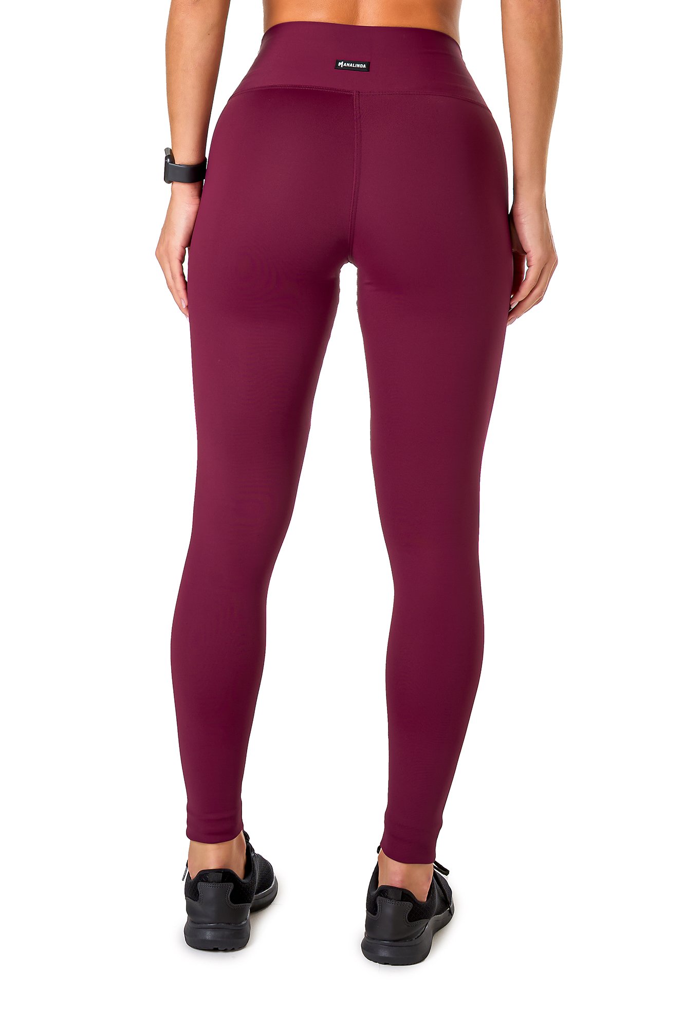Legging básica roxa em poliamida, projetado para conforto e mobilidade, ideal para treinos com estilo e praticidade.